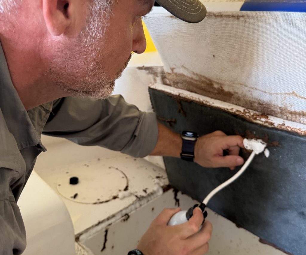 Bugman Josh working to remove bug.